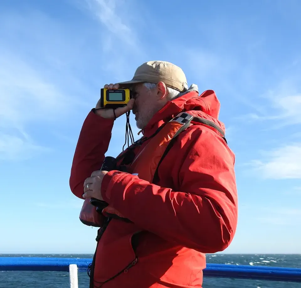 Digital-ESAS crew member actively birdwatching to collect data